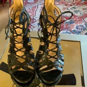 Black leather gladiator heels